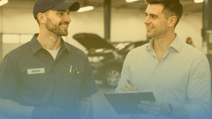 technician and service advisor talking to each other